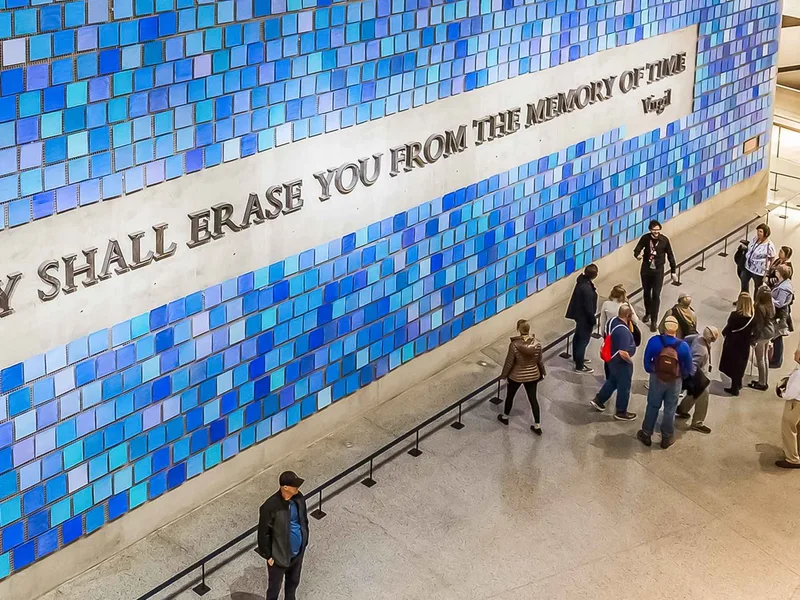 The reflecting pools of the 9/11 Memorial above the museum, a moving history museum in New York